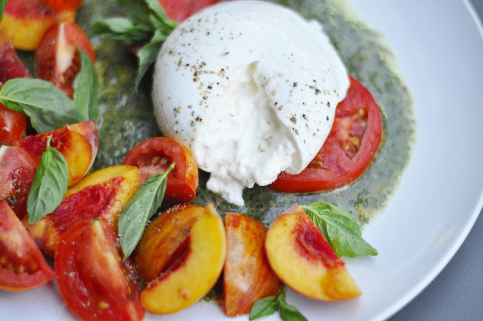 Peach, Tomato, and Burrata Salad Couple in the Kitchen