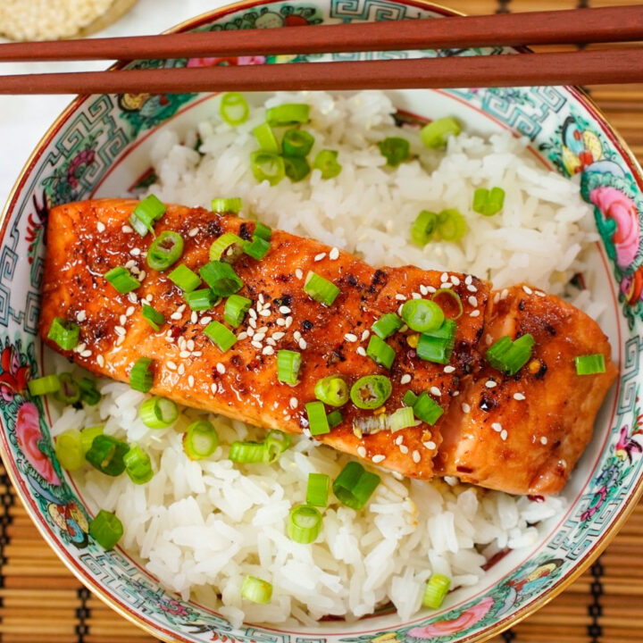 Hot Honey Sriracha Asian Marinade for Salmon on a salmon rice bowl.