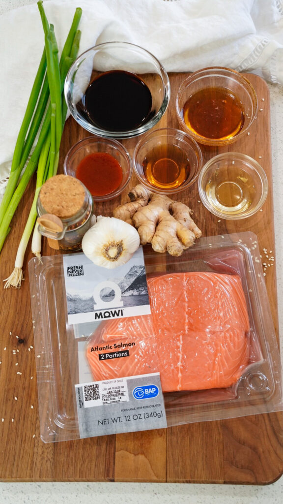 Ingredients for Hot Honey Sriracha Asian Marinade for Salmon on a cutting board.