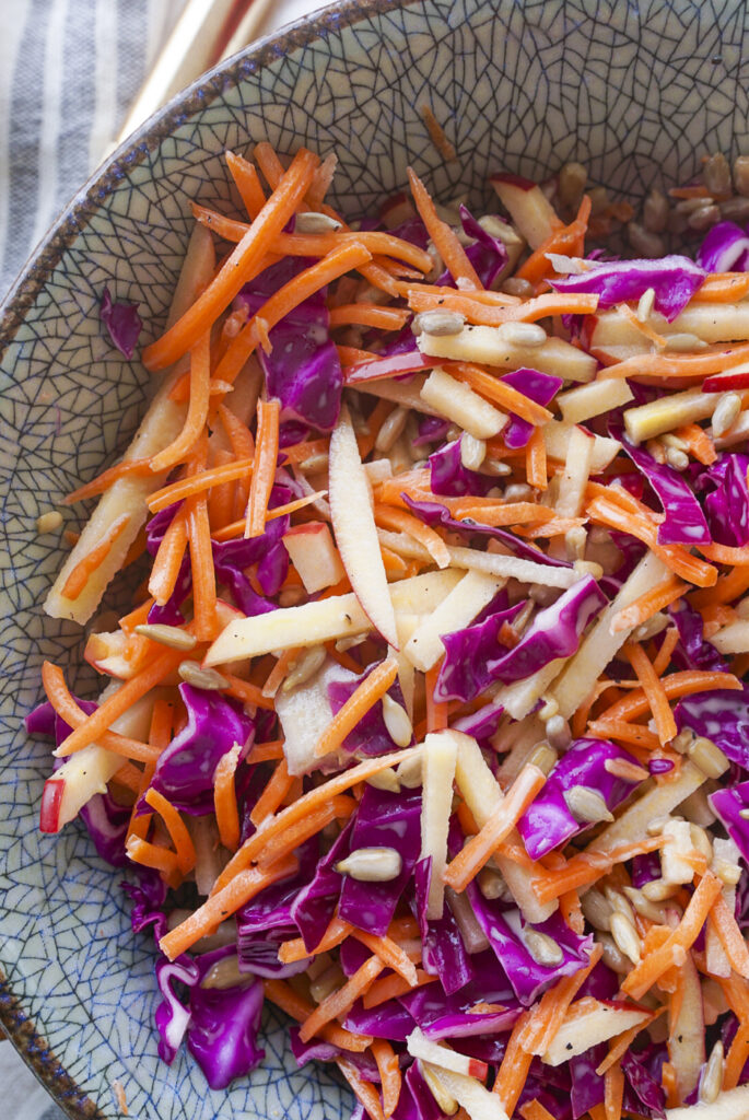 Apple cabbage slaw in a large bowl.