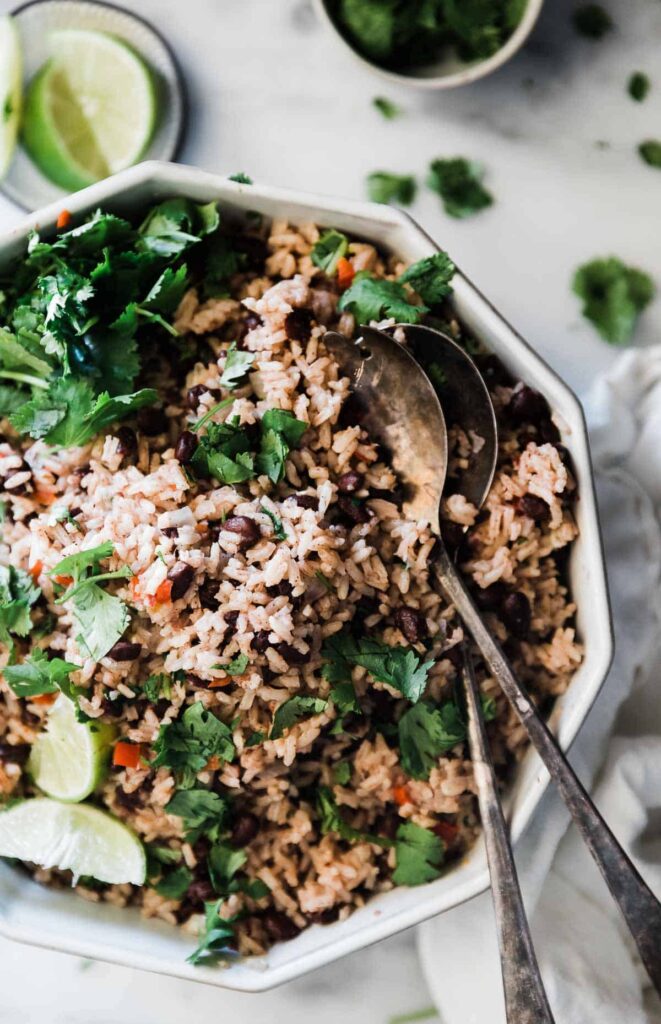 Rice and beans sides for fried fish.