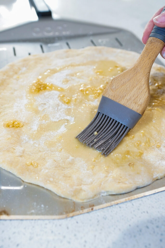 Making a homemade pizza for an ooni pizza oven.