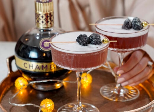 French martinis with chambord on a cocktail tray.