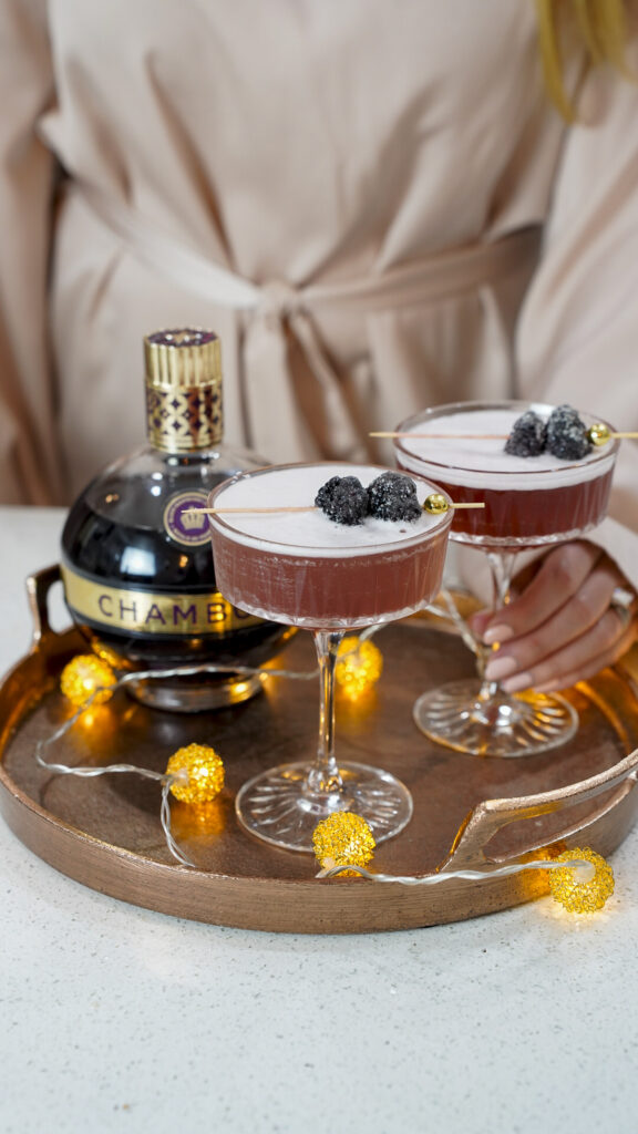 French martinis with chambord on a cocktail tray.