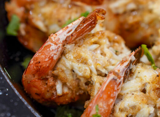 Crab stuffed shrimp in a cast iron pan.