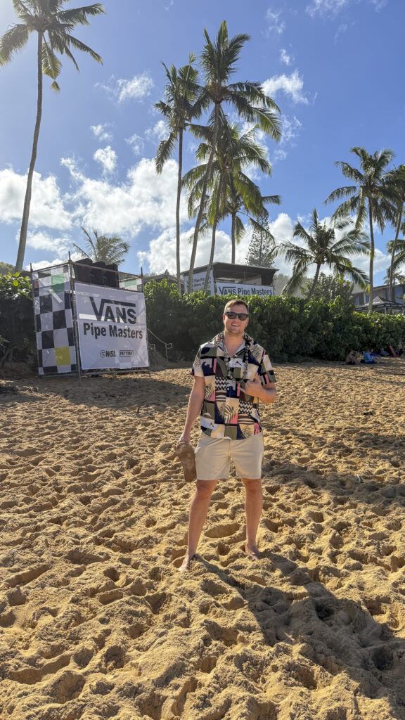 Man on the beach at Vans Pipe Masters in North Shore in Oahu, Hawaii.