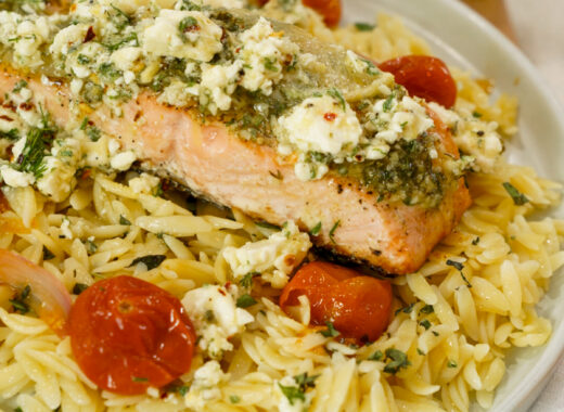 Baked Mediterranean Salmon Recipe with Marinated Feta on a plate.