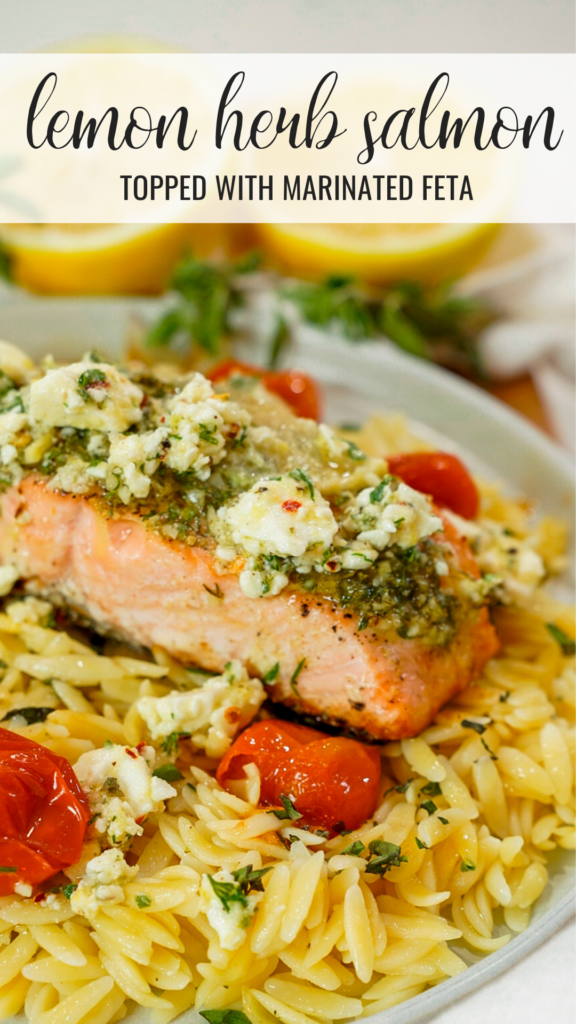 Baked Mediterranean salmon on a plate with orzo.