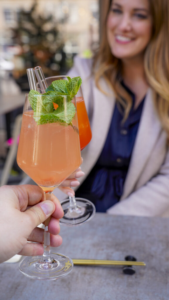 Couple with cocktails in Nuremberg, Germany.