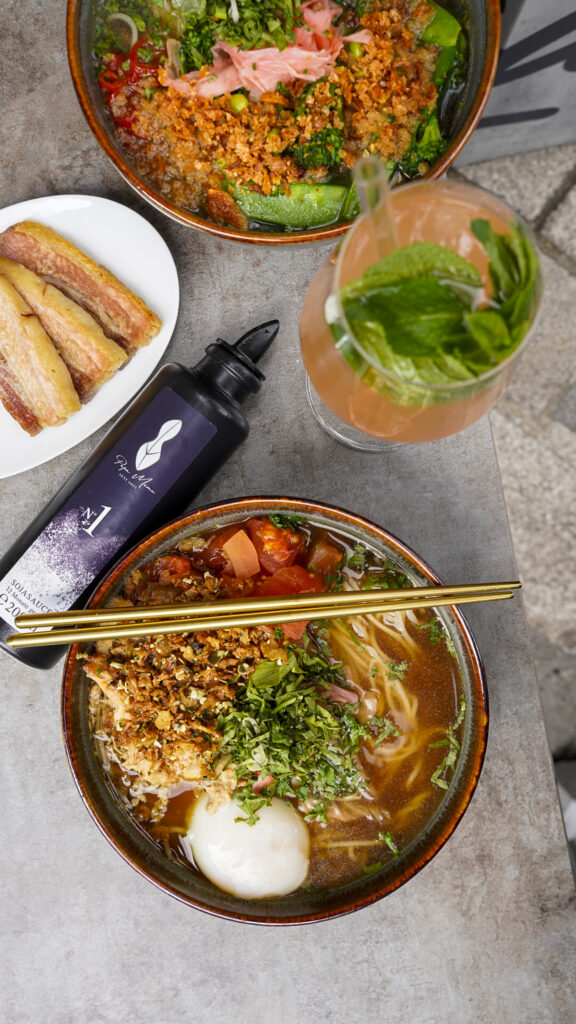 Table of ramen and cocktails in Nuremberg, Germany.