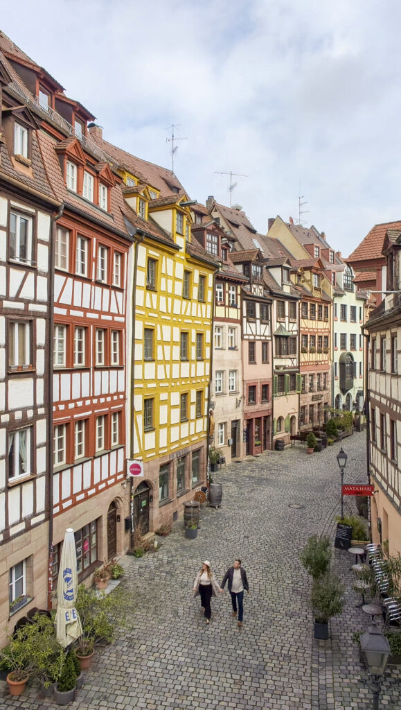 Couple walking the streets of Nuremberg, Germany.