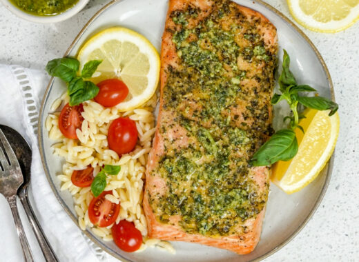 A plate topped with a grilled pesto salmon recipe.