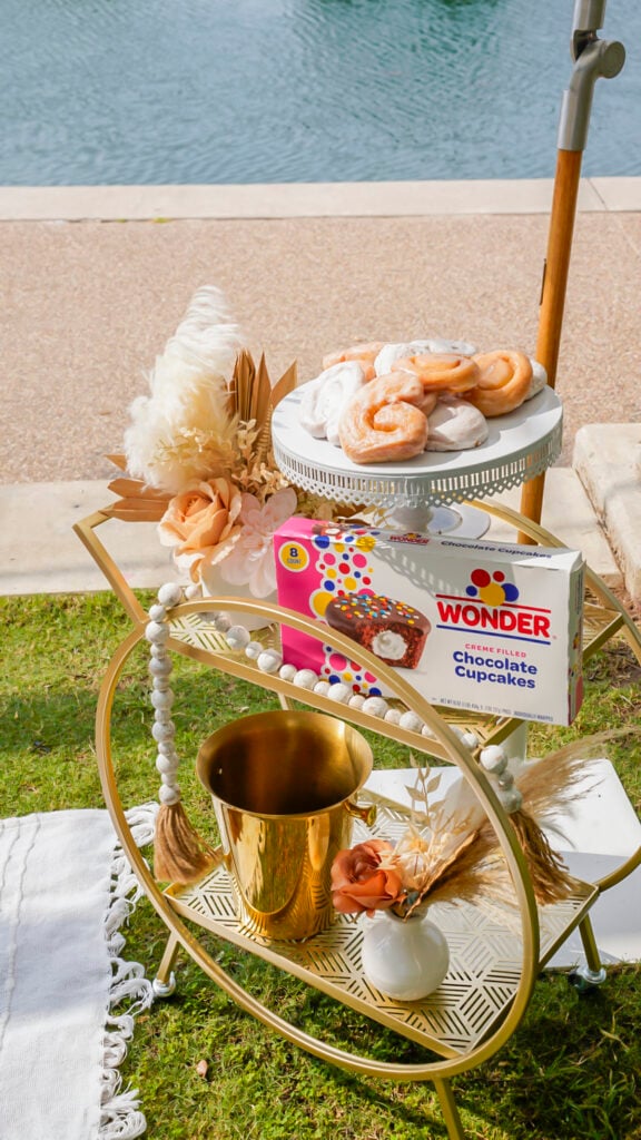 Platters of wonderbread sweets at a luxury picnic.
