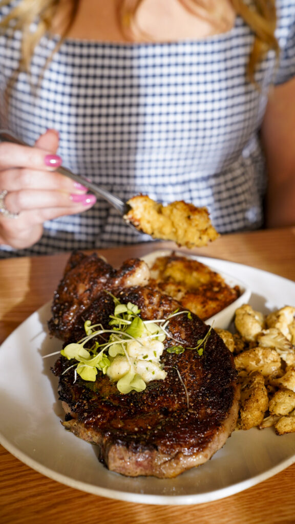 Steak and mac and cheese from a restaurant in Amarillo.