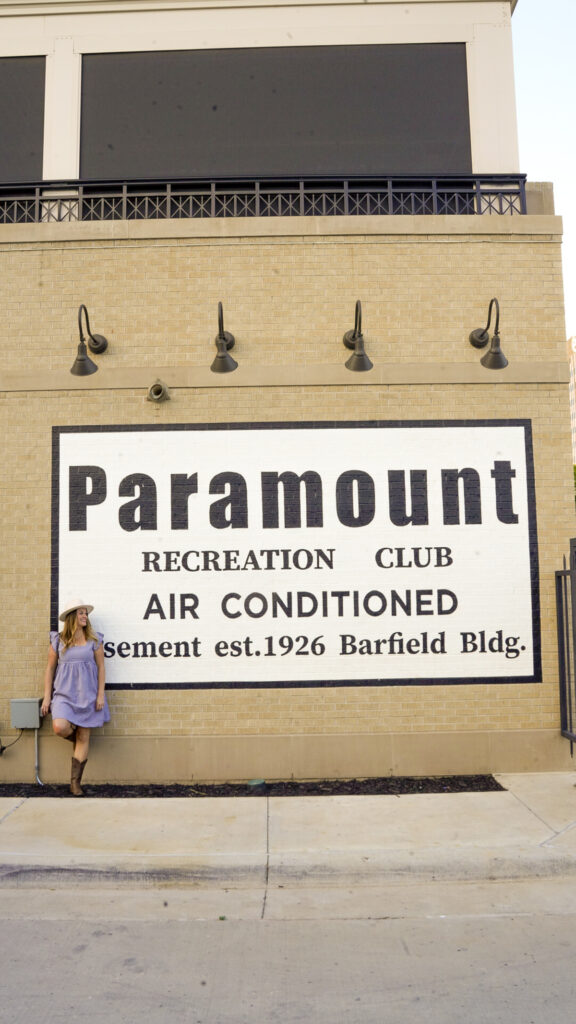 Woman outside Paramount Recreationt Club speakeasy in Amarillo, Texas.