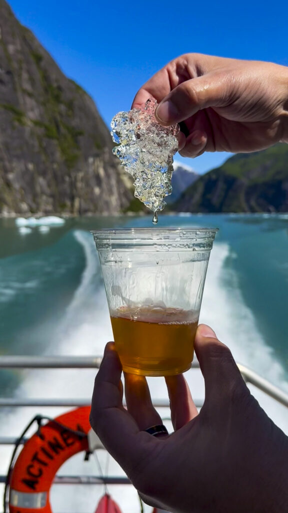 Cocktail made with glacier ice from the Tracy Arm Fjord on a tour from Juneau, Alaska.