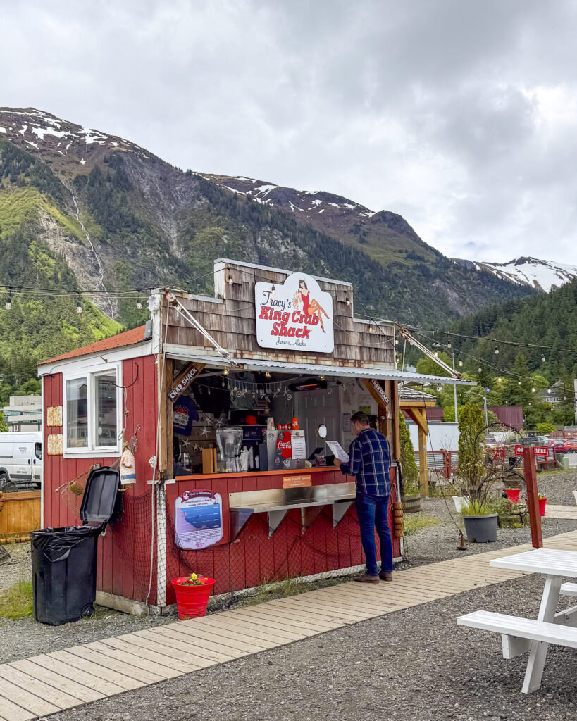 Man ordering at Tracy's Crab Shack, one of the best things to do in Juneau, Alaska.