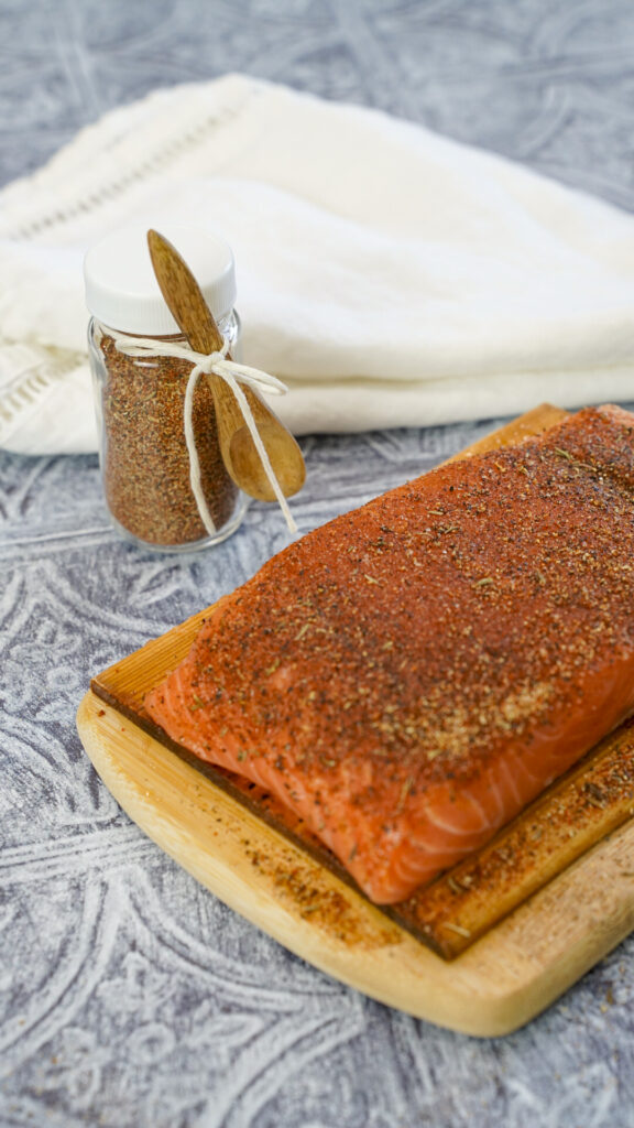 Blackened salmon on a plank.