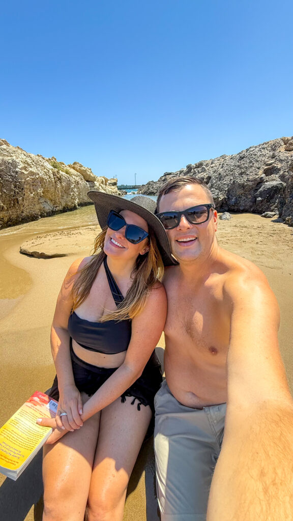Couple on the beach at Abaton luxury resort in crete greece.