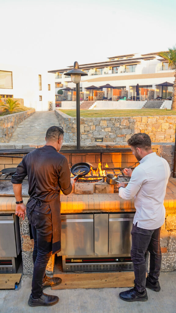 Men cooking at Elemes restaurant in Crete.