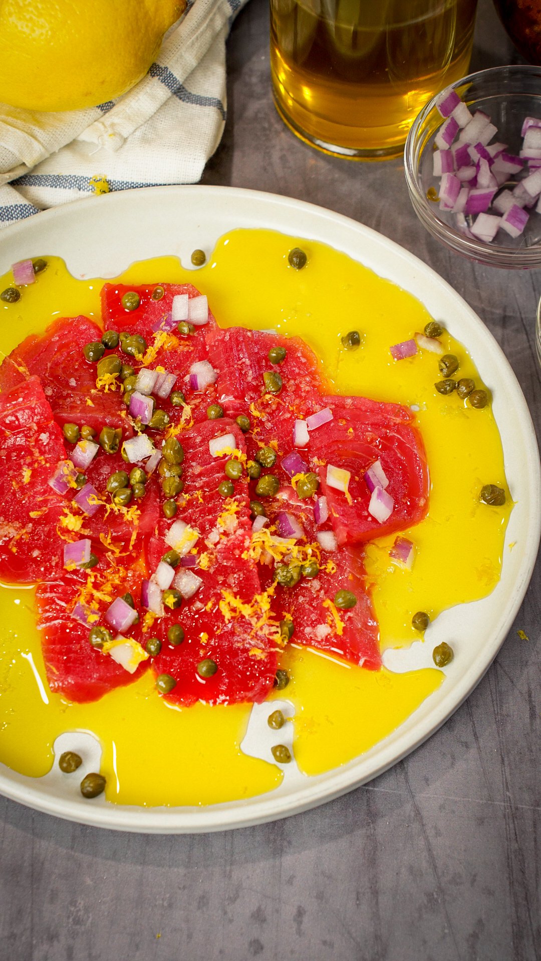 Sicilian sashimi tuna carpaccio recipe on a plate.