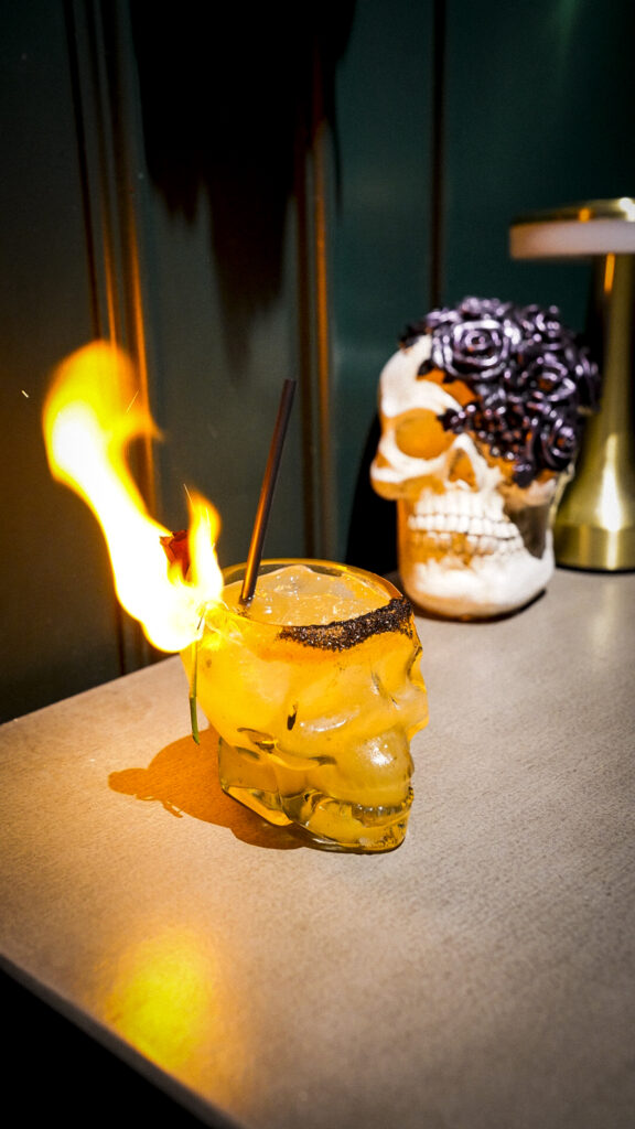 Skull cocktail glass that was lit on fire.
