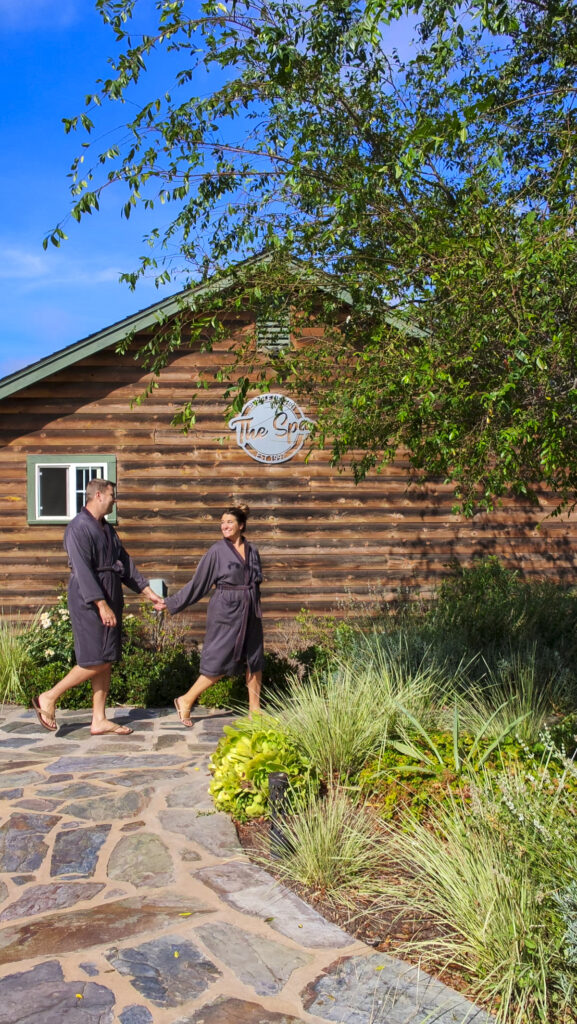 Couple outside the Purple Orchid spa, one of the Top Things to Do in Livermore and Tri-Valley for Couples.