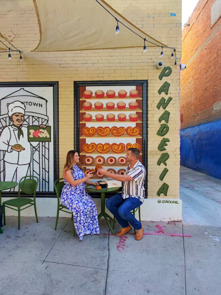 Couple outside of Pan Y Cafe in Santa Ana, California.