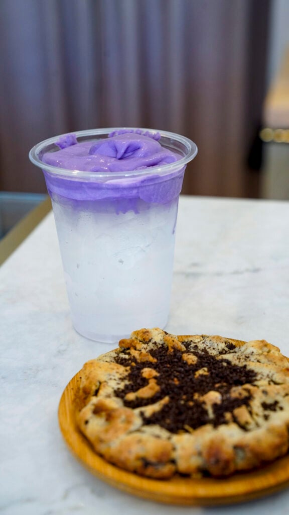 Ube coconut water and a cookie from a restaurant in Long Beach, California.