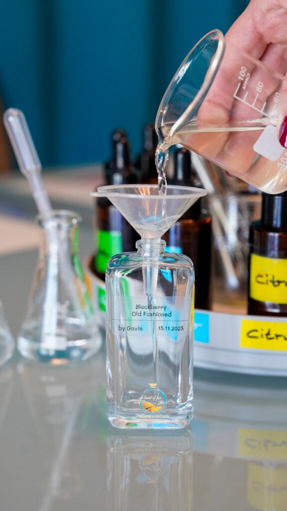 Bottling perfume at A scent of art perfume workshop in St. Martin.
