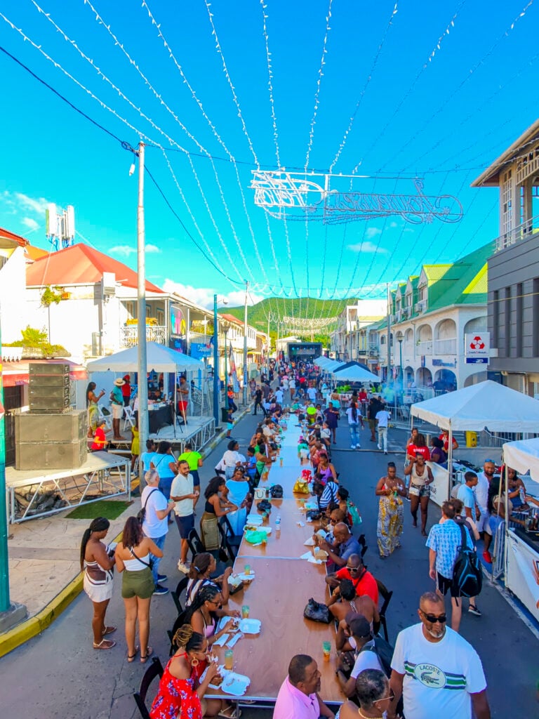 Line of tables at the St. Martin Food Festival BBQ Competition.