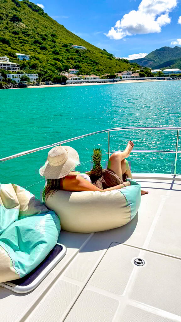 Woman with on a beanbag chair on a St. Martin private boat charter.