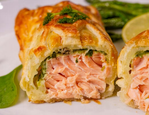 Salmon en Croute recipe sliced in half.