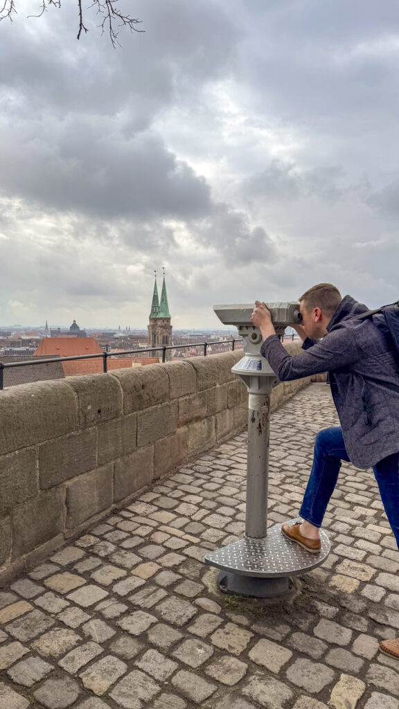Man looking over Nuremberg, Germany.