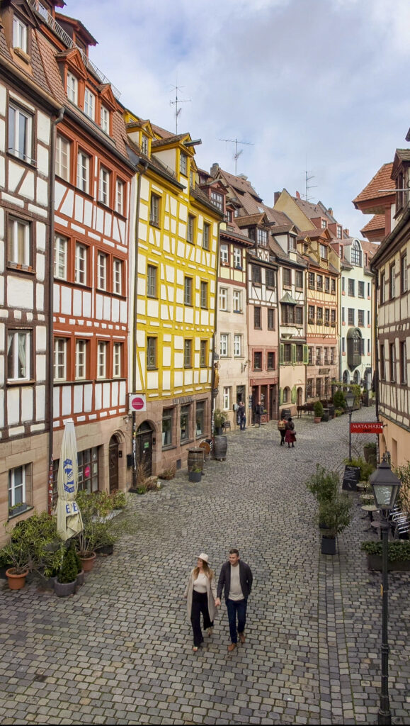 Couple walking the streets in Nuremberg, Germany.