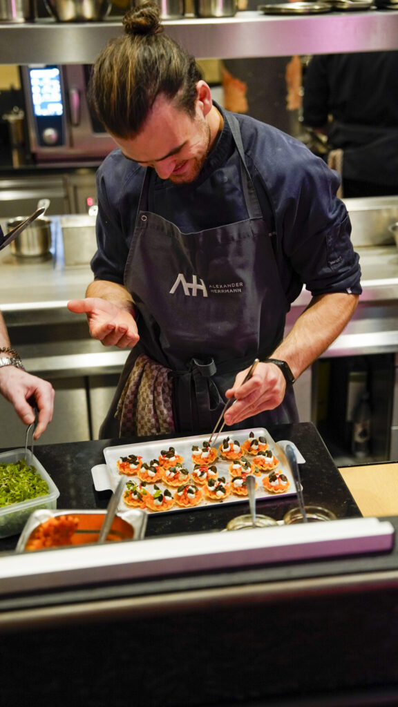 Chef plating food at Imperial Restaurant in Nuremberg, Germany.