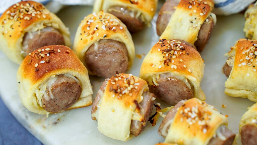 Brats in a blanket recipe for an oktoberfest party.