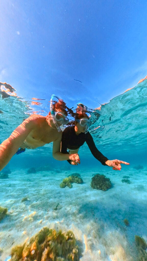 Couple snorkling in Moorea.