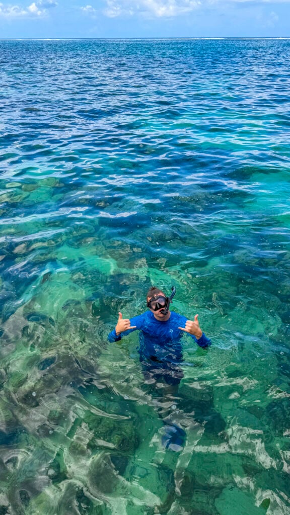 Man snorkling at a pearl farm in Raiatea, a stop on the Windstar Tahiti French Polynesia cruise.