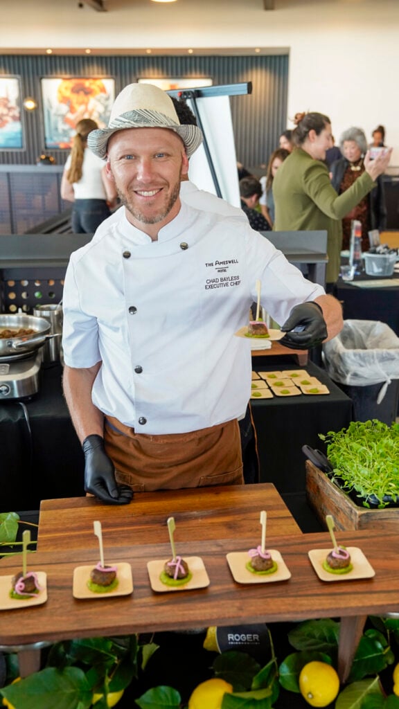 Chef with a dish at the San Francisco Peninsula Flavors of the Peninsula event.