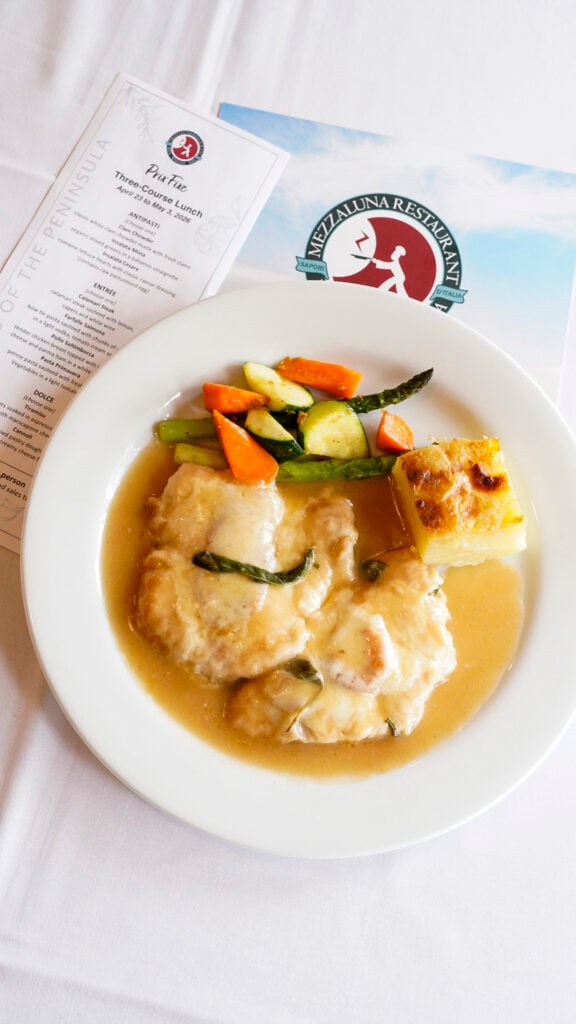 Dishes on the table from Mezza Luna restaurant in the San Francisco Peninsula Flavors of the Peninsula event.