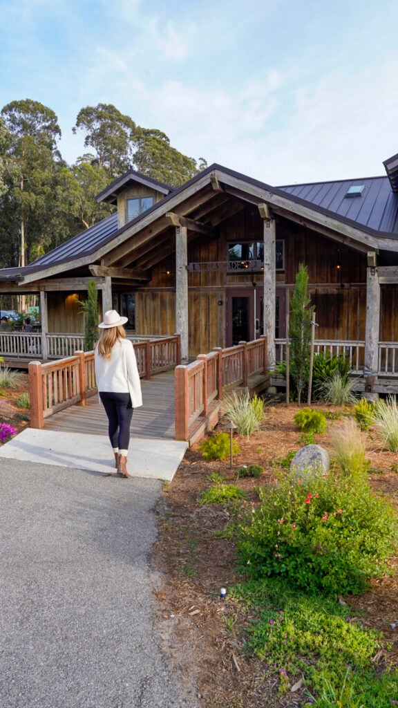 Woman walkin into Cascade restaurant in the San Francisco Peninsula Flavors of the Peninsula event.