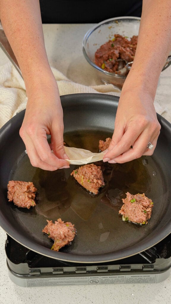 Ground Beef Viral No Fold Blanket Dumpling Recipe in a pan.