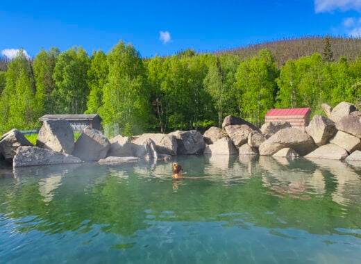 Woman relaxing at the Chena Hot Springs in Fairbanks Alaska in summer.