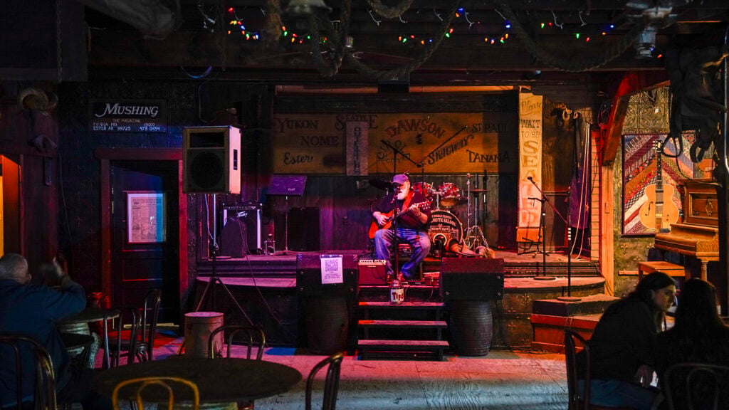 Musican at the Malamute Saloon, one of the best things to do in Fairbanks Alaska.