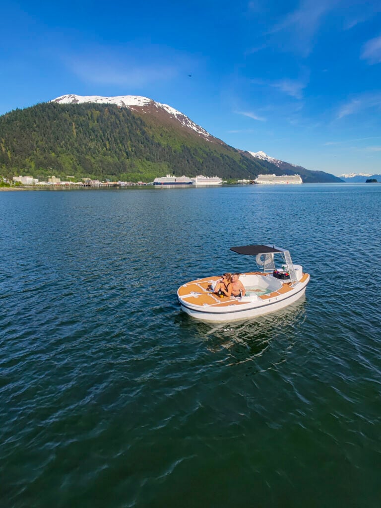 Couple in the Juneau hot tub boat - Things to do in Juneau Alaska from a cruise ship.