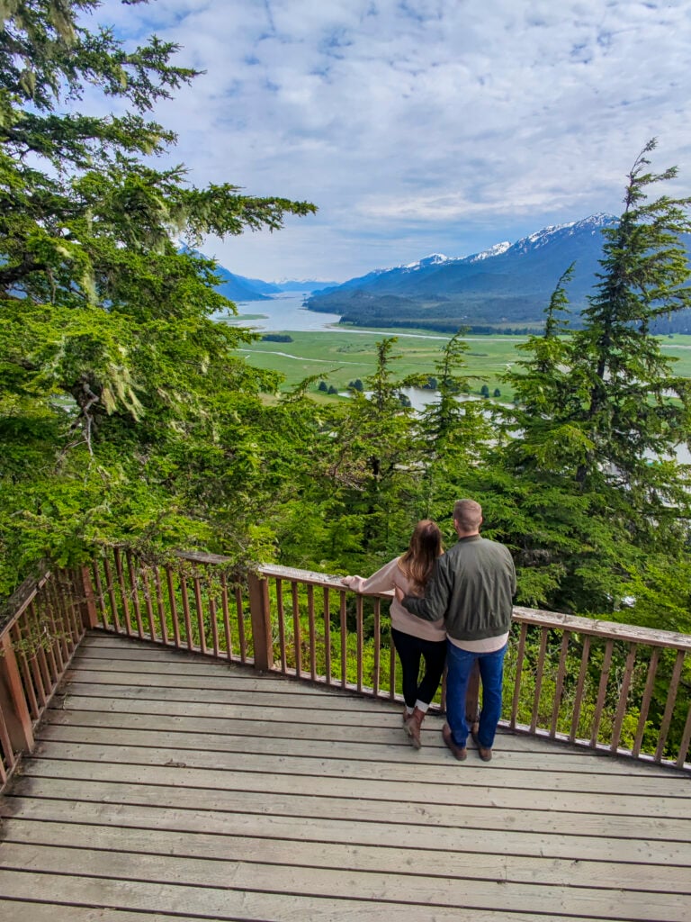 Couple looking at the view in Juneau, Alaska.
