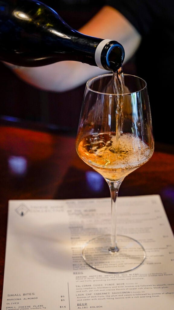 Wine being poured at a Lake Tahoe wine tasting.